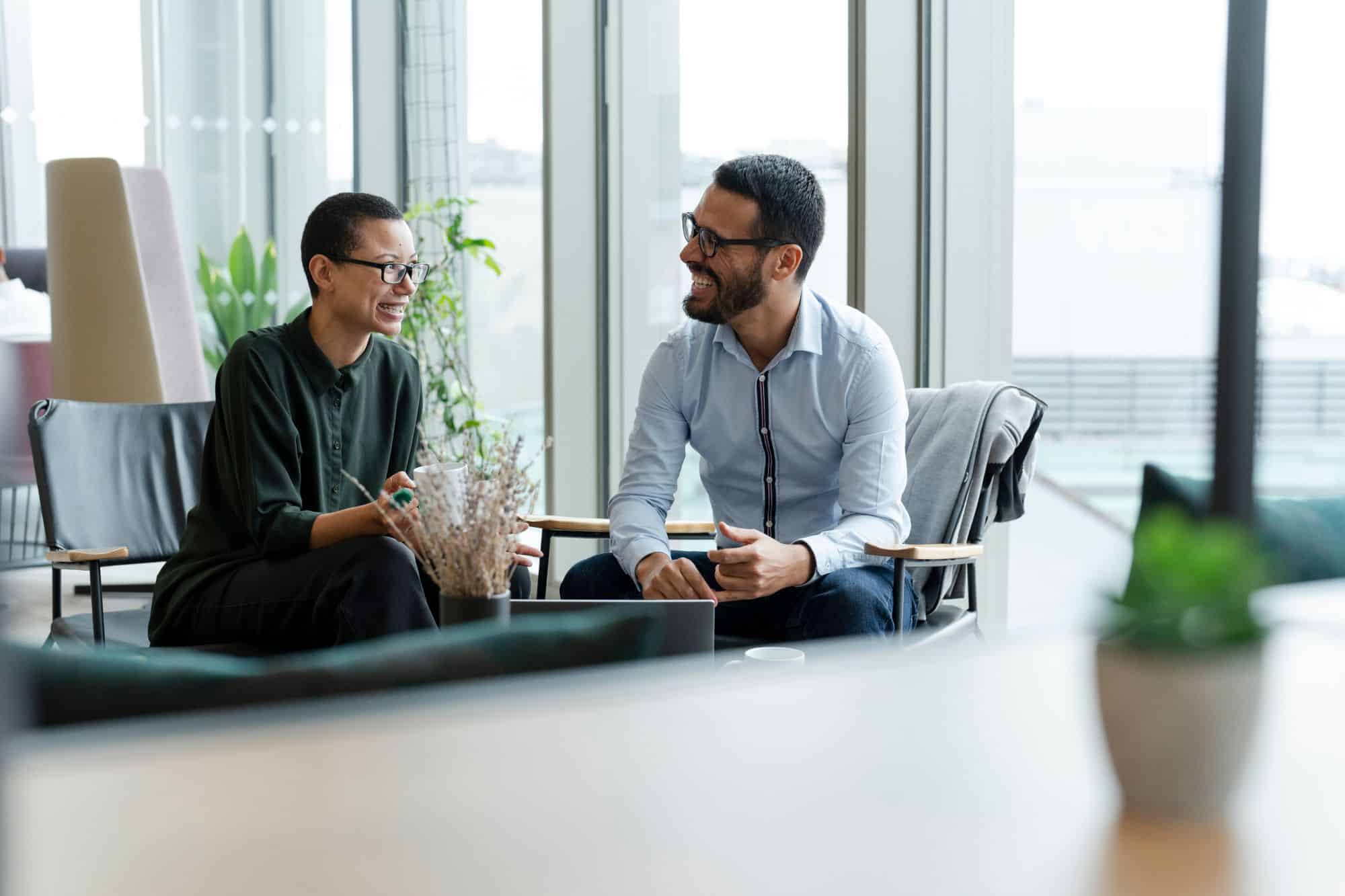 two people talking in an office